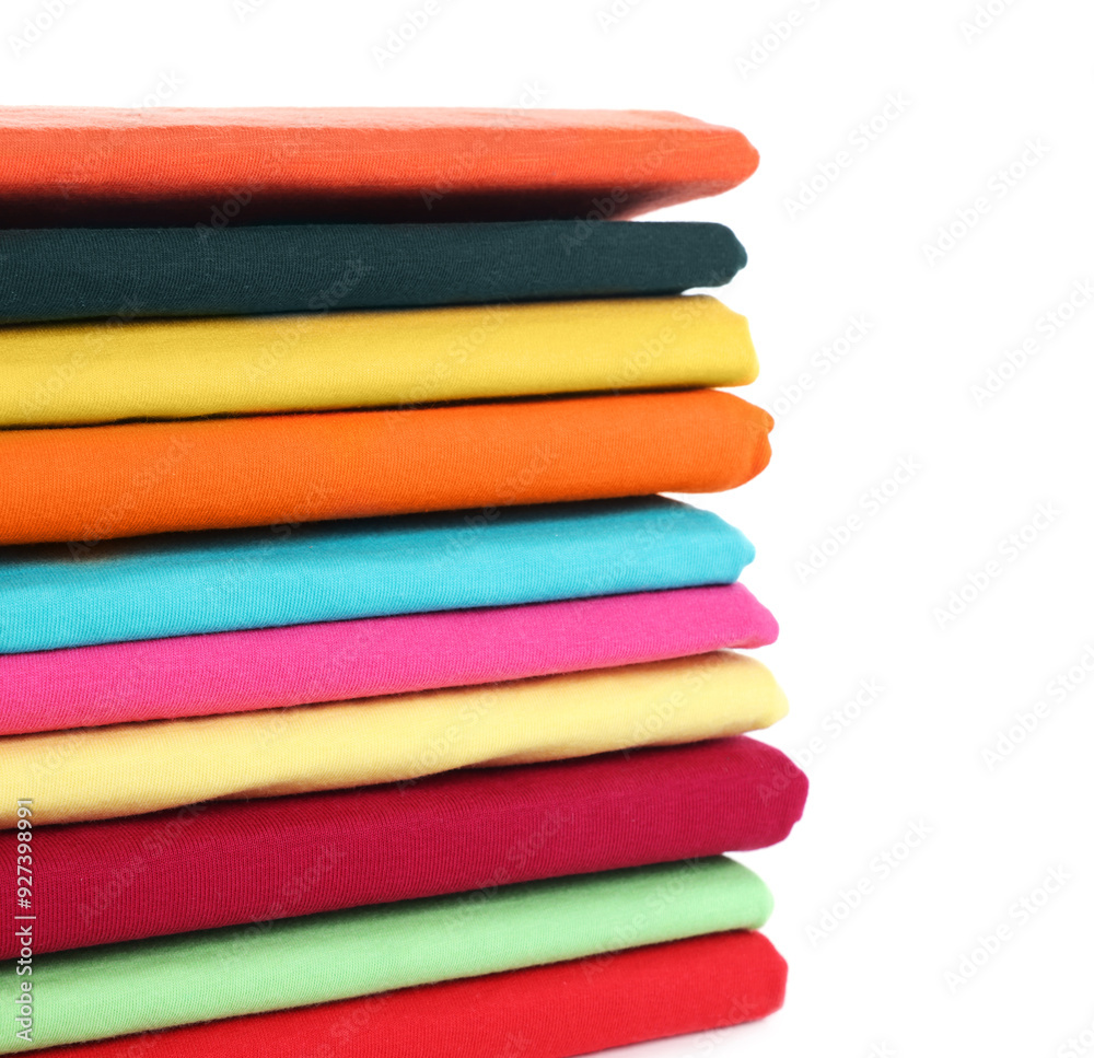 Stack of clean colorful t-shirts isolated on white Stack of clean colorful t-shirts isolated on white