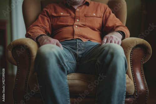 A Guy Slumped In Chair Afte...