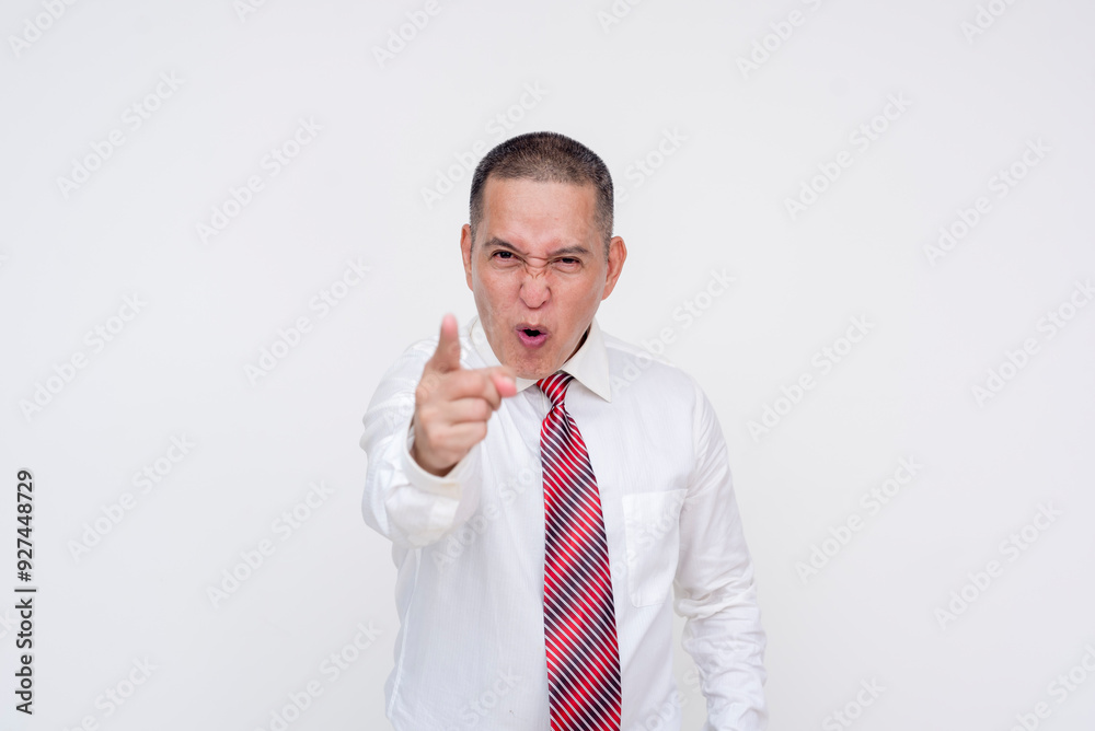 An irate middle aged asian manager scolding an employee. Point of view of employee. Isolated on a white background. An irate middle aged asian manager scolding an employee. Point of view of employee. Isolated on a white background.
