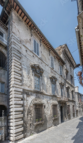 facade of historical building on narrow street, Narni, Italy photo