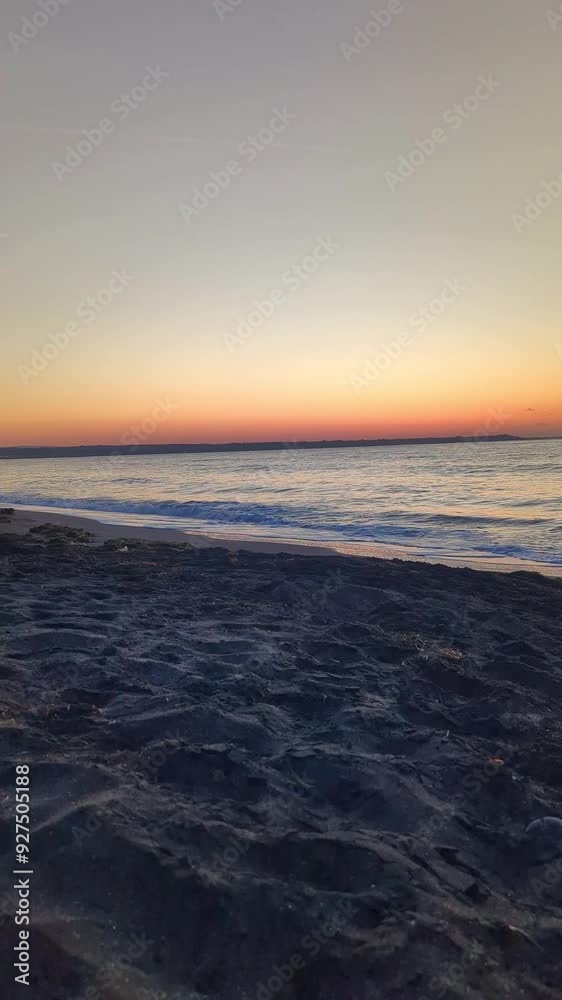 Quiet and peaceful morning at sunrise on a sandy seaside shore. Quiet and peaceful morning at sunrise on a sandy seaside shore.