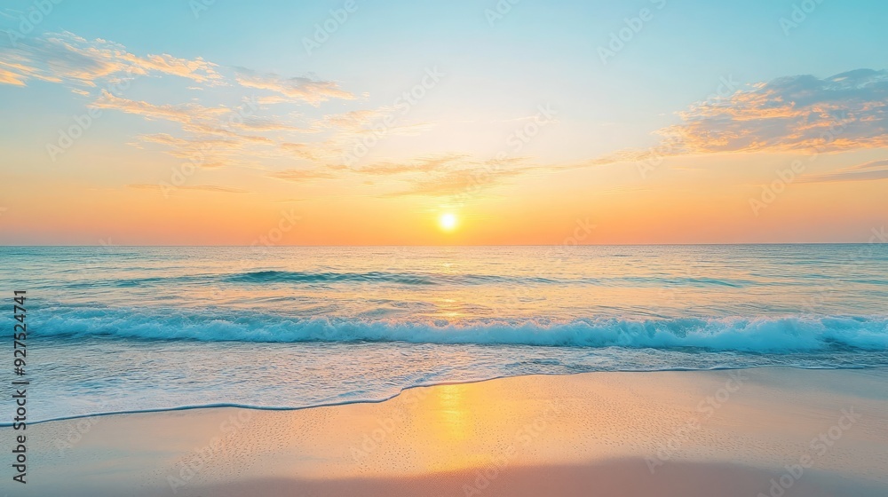 Fototapeta premium Elegant beach sunset with a gradient sky shifting from golden yellow to soft blue. The calm waves and distant horizon enhance the peaceful atmosphere of a seaside sunset.