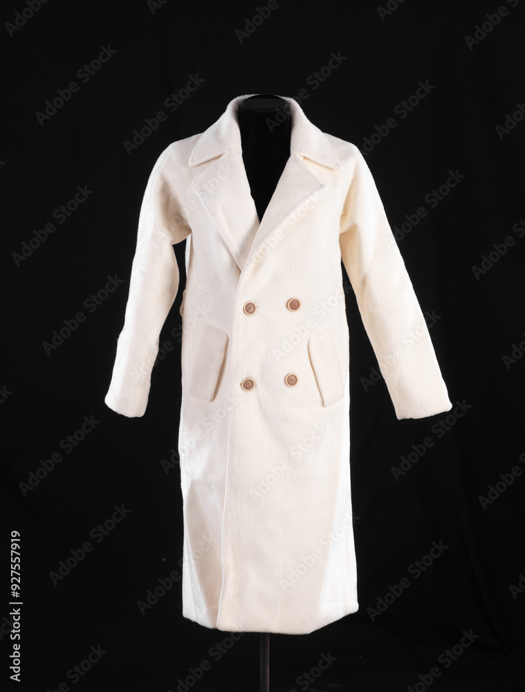 white wool woman coat on mannequin white wool woman coat on mannequin
