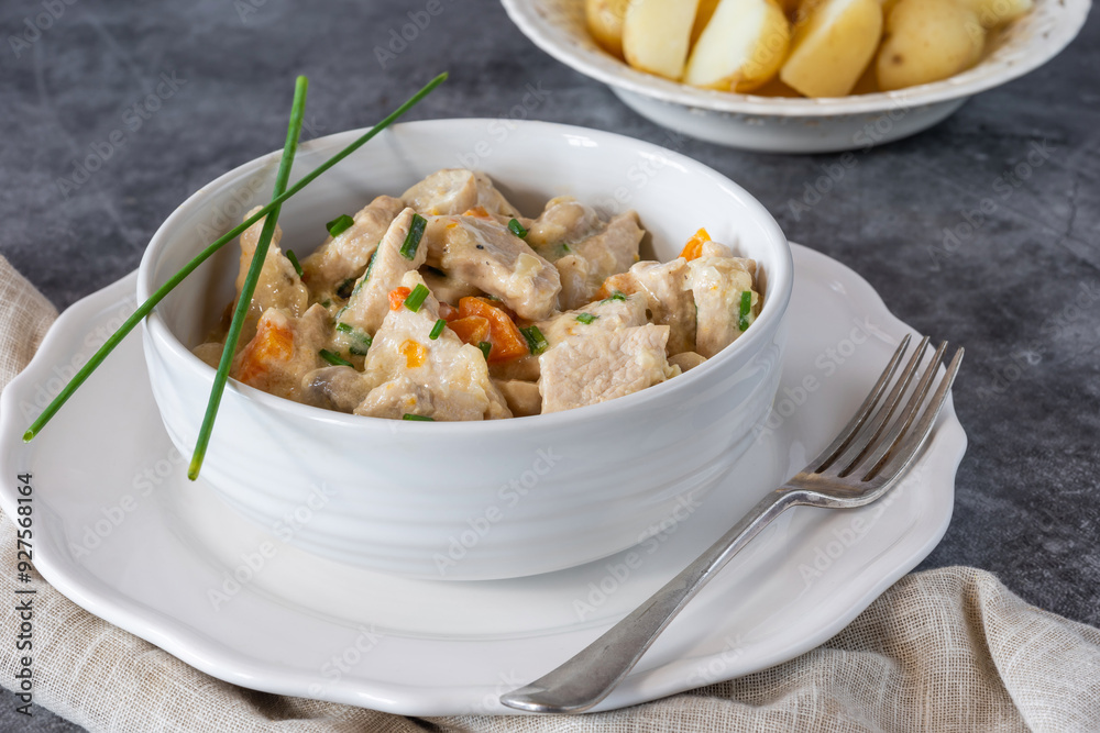 Pork in creamy mushroom sauce with boiled baby potatoes Pork in creamy mushroom sauce with boiled baby potatoes