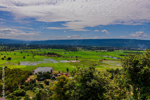 Natural background, high angle view from the observation point, blurred golden rays of the sun visible. The mountains that were setting on the horizon, changed beautifully with the wind. photo