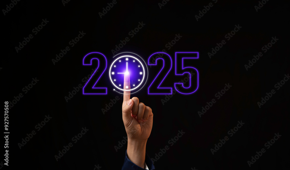 Hand touching clock time to change from 2024 to 2025, the clock is ticking towards 2025, countdown of merry Christmas and happy new year, business planning and strategy future concept.