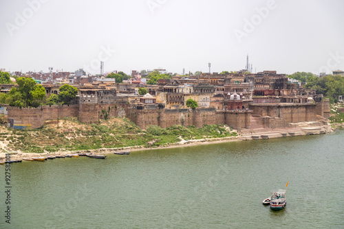 View of the ancient Ramnagar Fort from the river Ganges. The Ramnagar Fort of Varanasi was built in 1750 in typical Mughal style of architecture. photo