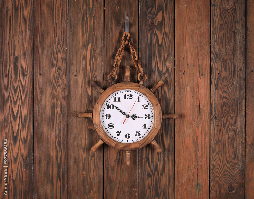 sea wall clock on old wooden wall sea wall clock on old wooden wall