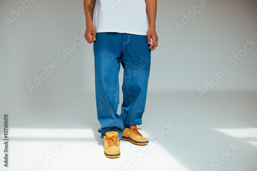 Obraz na płótnie Mens Fashion in Blue Regular Jeans Design Modern Denim for People Concept. w salonie