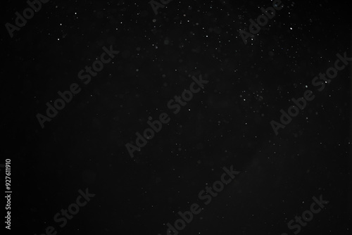 abstract real dust floating over black background for overlay
