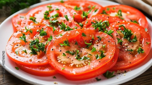 A neatly arranged plate of juicy tomato slices, garnished with parsley, capturing the freshness and simplicity of this healthy dish.