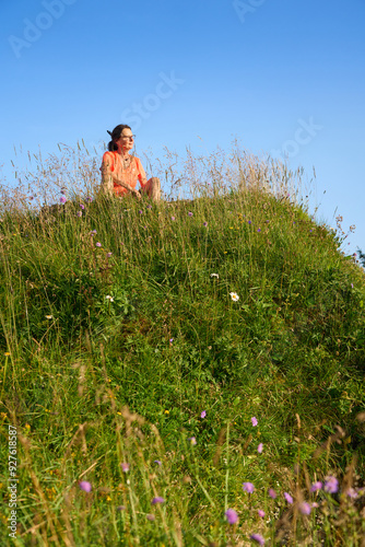 pretty senior woman hiking ...