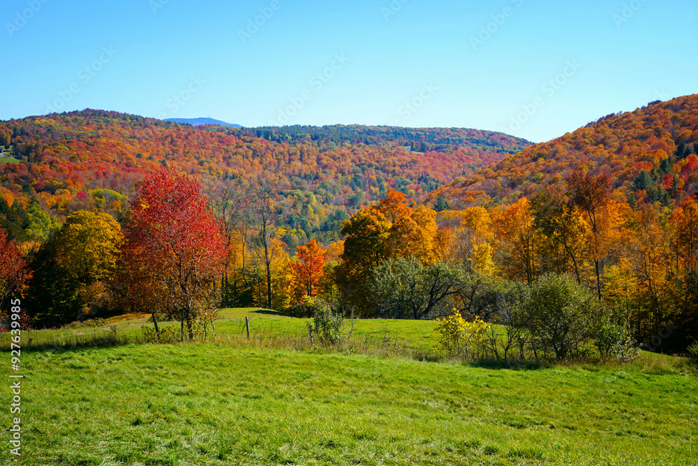 Beautiful autumn colors along the rolling hills of rural Vermont, USA Beautiful autumn colors along the rolling hills of rural Vermont, USA