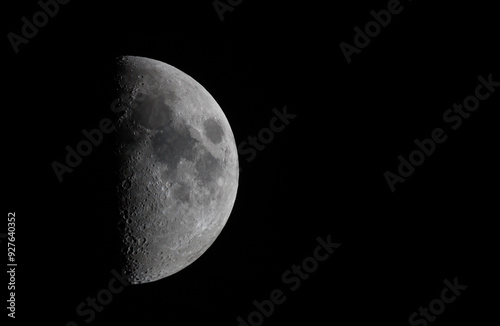 Moon on the black background in telescope  photo