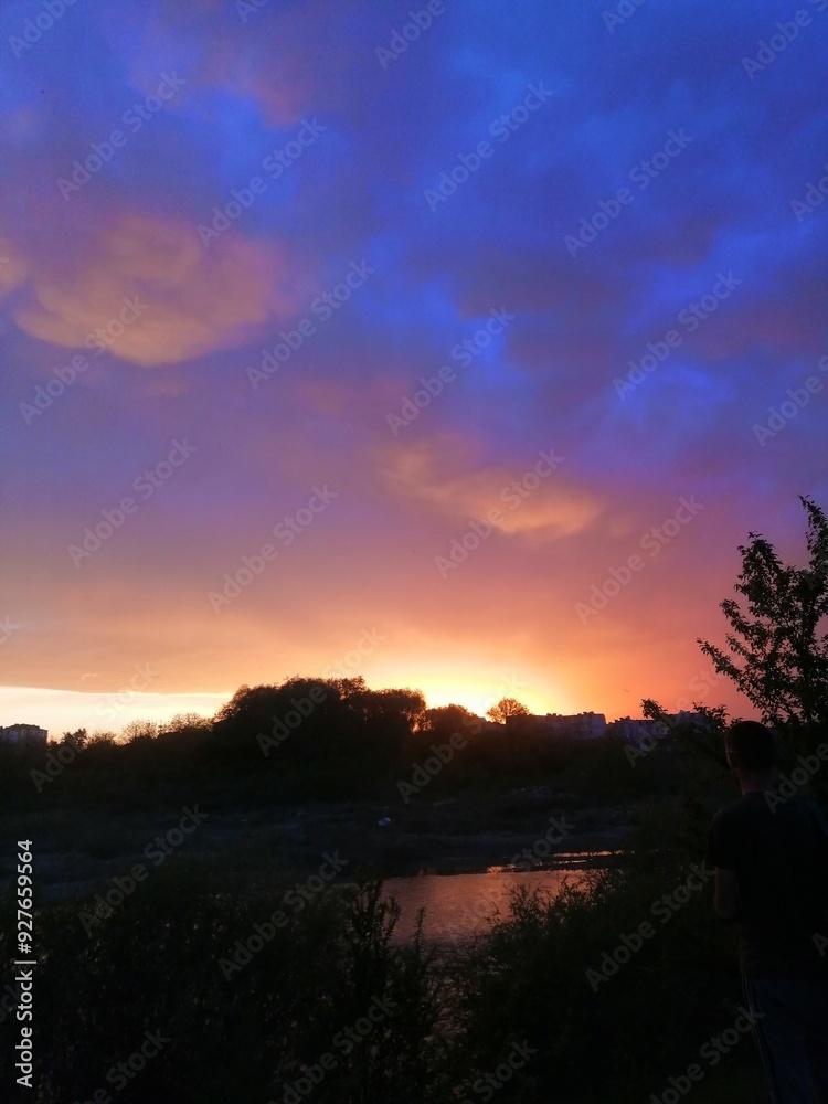 Obraz premium sunset over the river