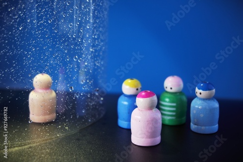 Exclusion from group. Not belonging to a group and being excluded from society. Loneliness and rejected, lost and alone. Psychological effect and therapeutic representation. photo