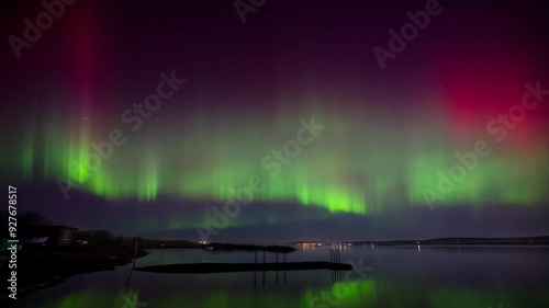  Aurora over the Harray loch with mirror reflections in 4K photo