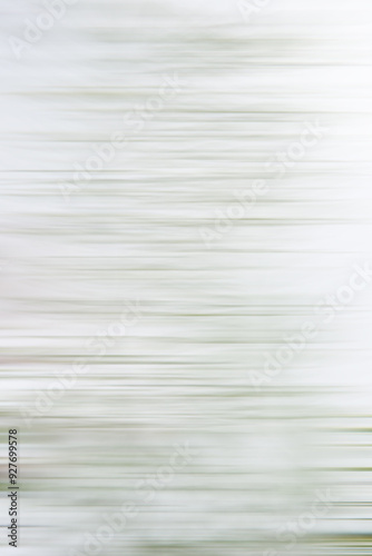 Abstract blurry background, horizontal green lines on light.