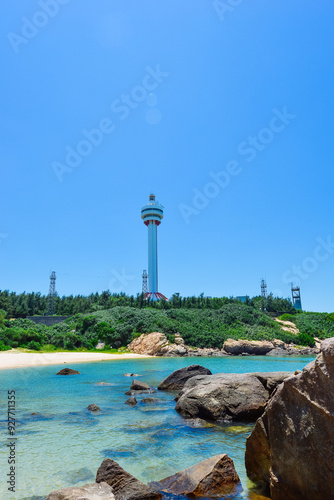 beautiful tropical landscape of Mulan lighthouse and sea & ocean at Mulan Bay, Wenchang, Hainan, China photo