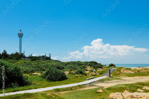 beautiful tropical landscape of Mulan lighthouse and sea & ocean at Mulan Bay, Wenchang, Hainan, China photo