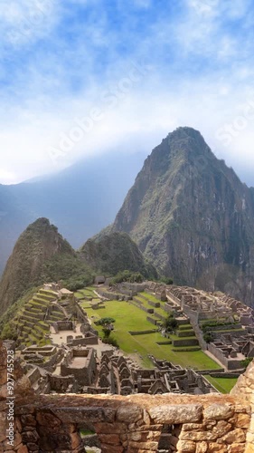 Machu Picchu Through Ancient Stone Walls Vertical View