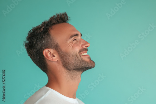 A close up of a man's face with her eyes closed