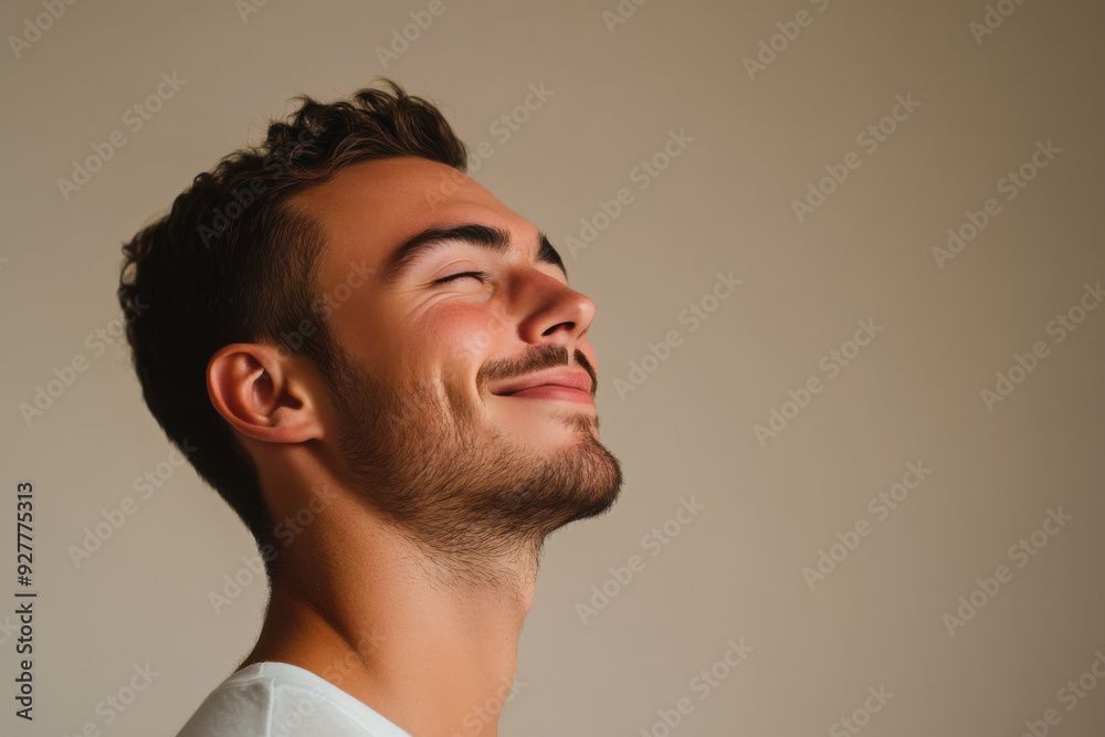 A close up of a man's face with his eyes closed