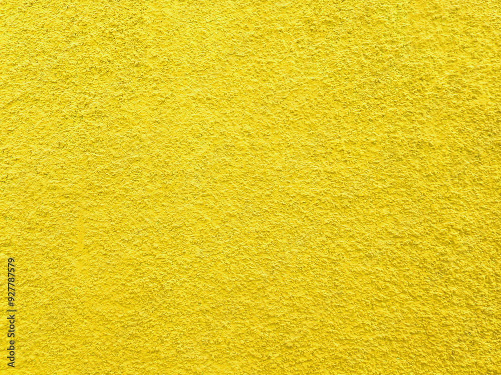 Fototapeta premium Yellow Surface Cement Wall Painted Texture. Abstract rough cement wall background.