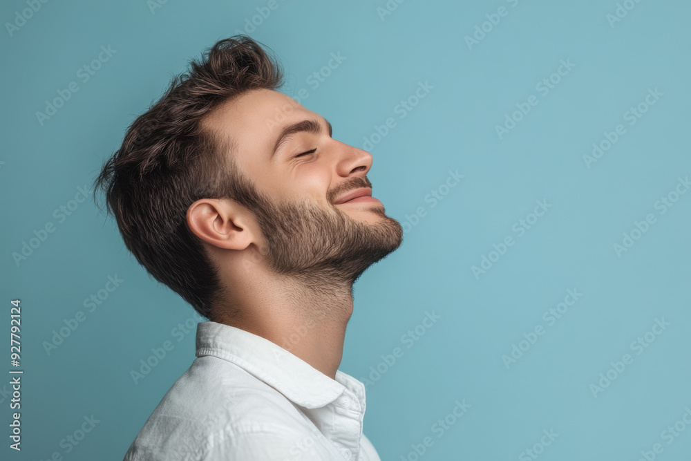Obraz premium A close up of a man's face with his eyes closed