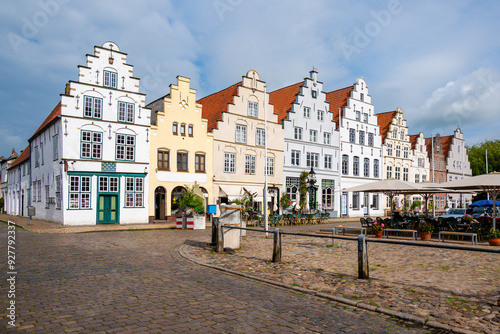 Houses with stepped gables on the west side of the historic market square in Friedrichstadt; Germany