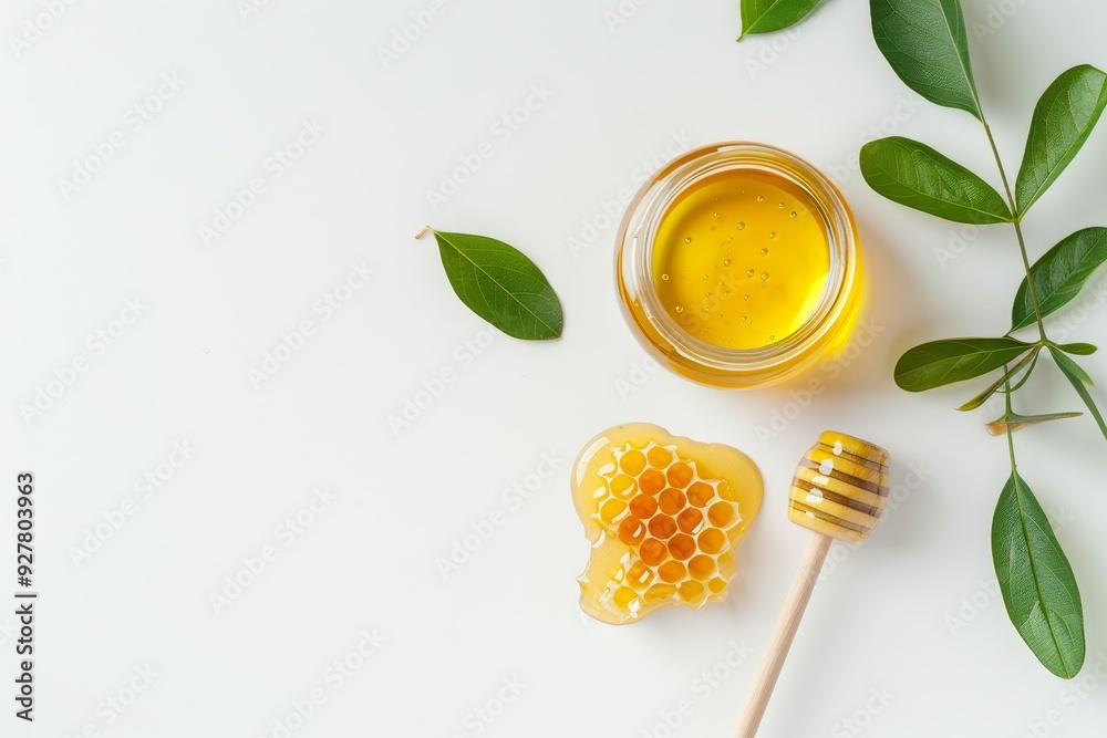 Delicious Honey and Honeycomb with Fresh Green Leaves on Display. Delicious Honey and Honeycomb with Fresh Green Leaves on Display.