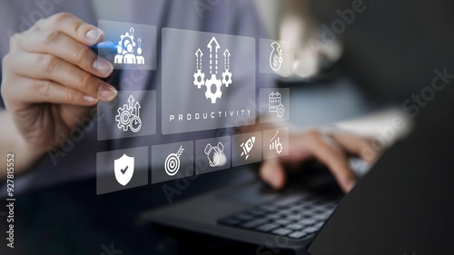 A business person using laptop with visual screen increase productivity concept.