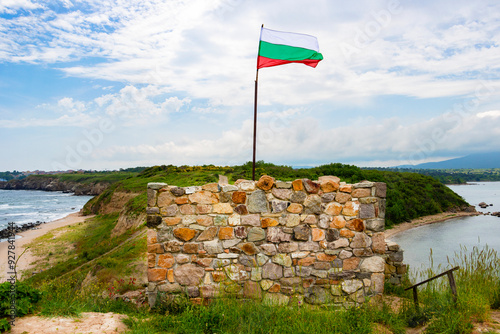 Cape Akra Fortress, early Byzantine fortress from the 6th century near Chernomorets, Province of Burgas, Bulgarian Black Sea coast with the Bulgarian flag
