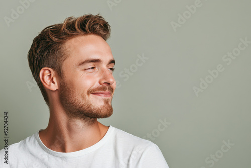 A close up of a man's face with his eyes closed