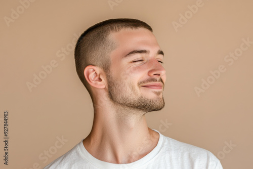 A close up of a man's face with his eyes closed