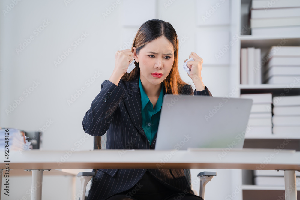 Overwhelmed: Stressed Asian Businesswoman Battles Deadline Pressure