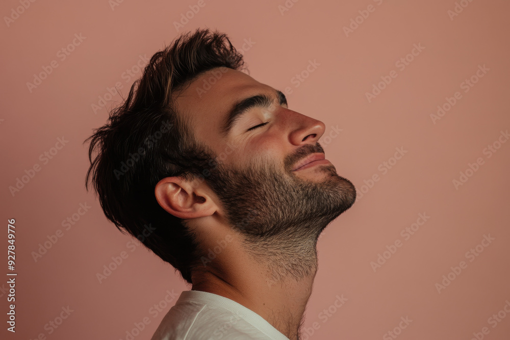 Obraz premium A close up of a man's face with his eyes closed