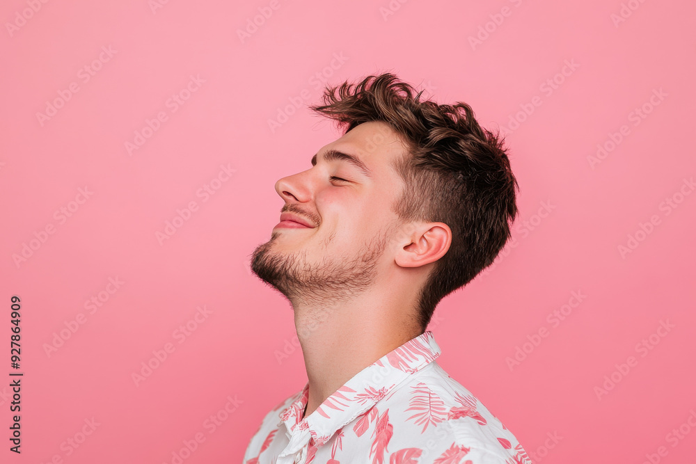 Fototapeta premium A close up of a man's face with his eyes closed