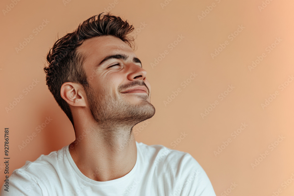 A close up of a man's face with his eyes closed