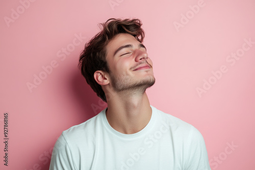 A close up of a man's face with his eyes closed