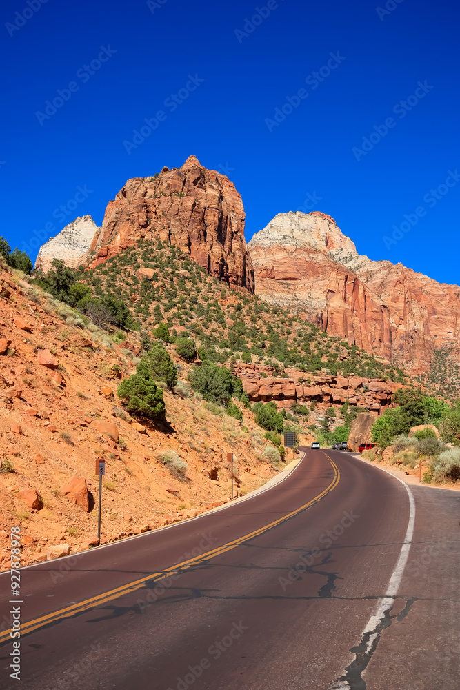 Scenic route through Red Sandstone rock formations at Zion national park. Scenic route through Red Sandstone rock formations at Zion national park.