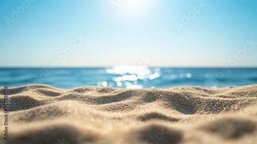 Closeup of Sand on a Beach with Blue Ocean and Sky