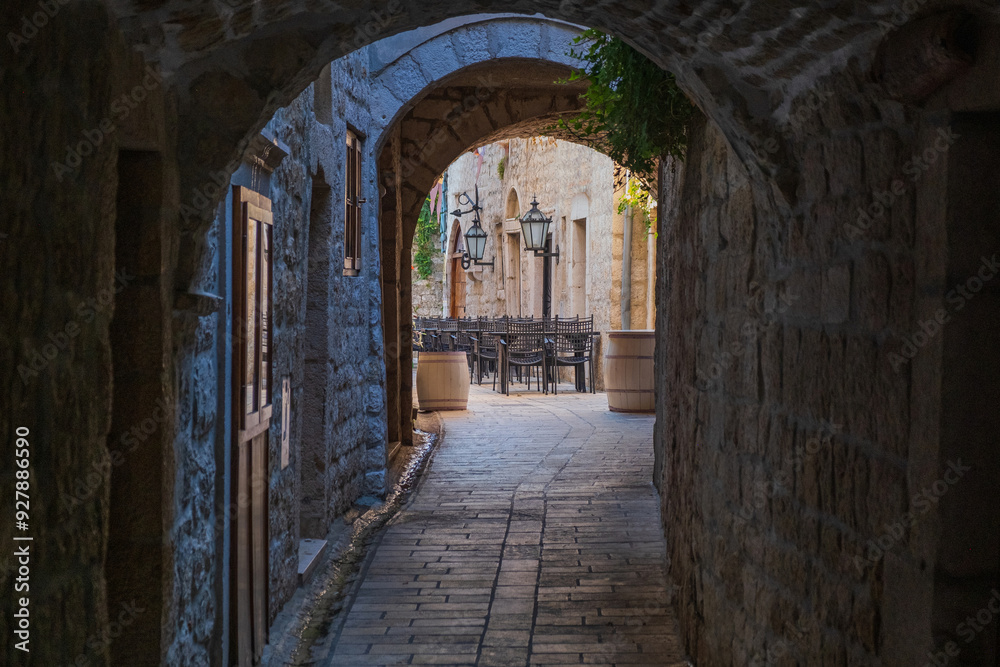 Romantic old narrow cobbled streets and passages in the old town of Rab, Croatia