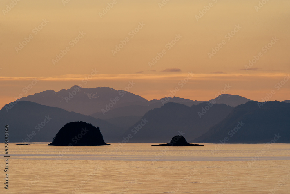 Stephen's Passage at sunset along Southeast Alaskan coastline along the inside passage in summer Stephen's Passage at sunset along Southeast Alaskan coastline along the inside passage in summer