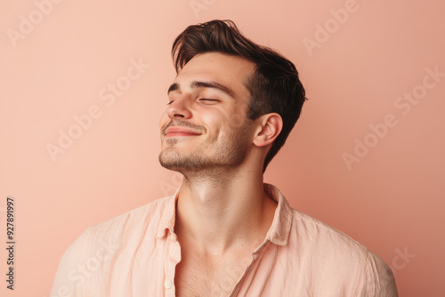 A close up of a man's face with his eyes closed