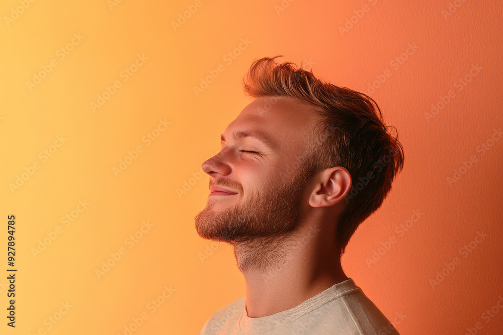 A close up of a man's face with his eyes closed