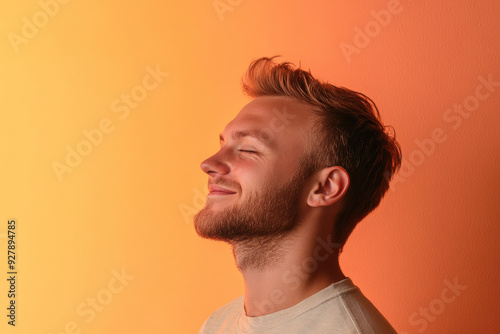 A close up of a man's face with his eyes closed