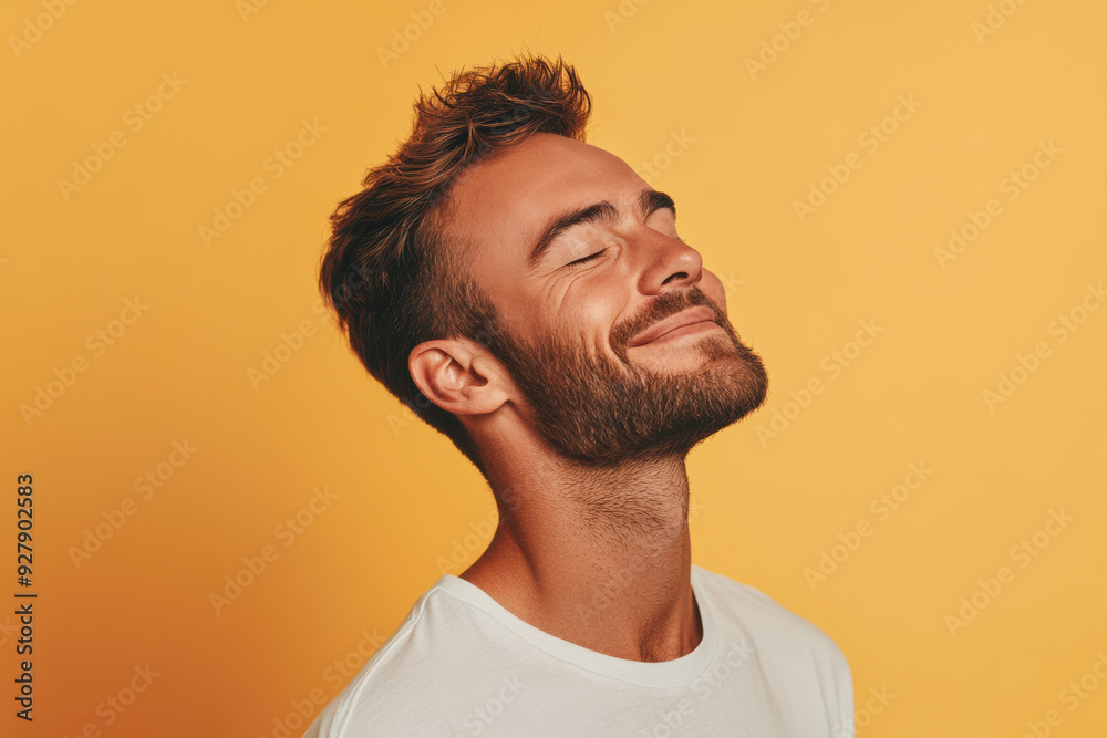 Obraz premium A close up of a man's face with his eyes closed
