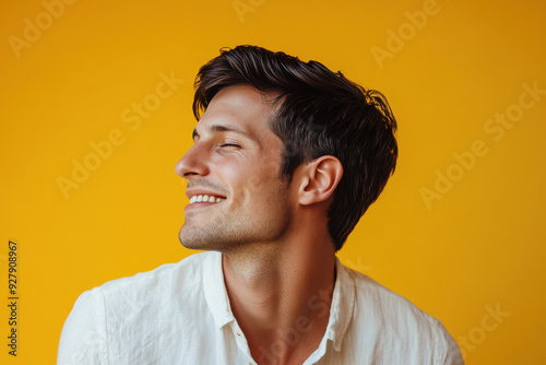 A close up of a man's face with her eyes closed photo