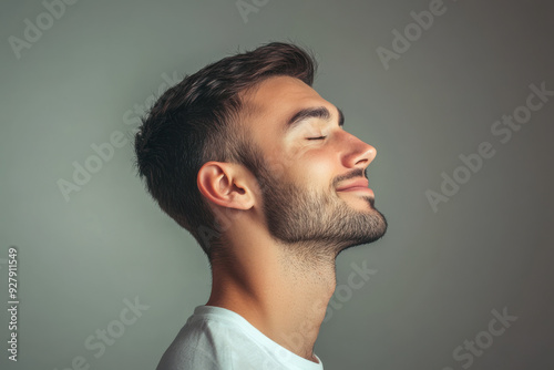 A close up of a man's face with her eyes closed